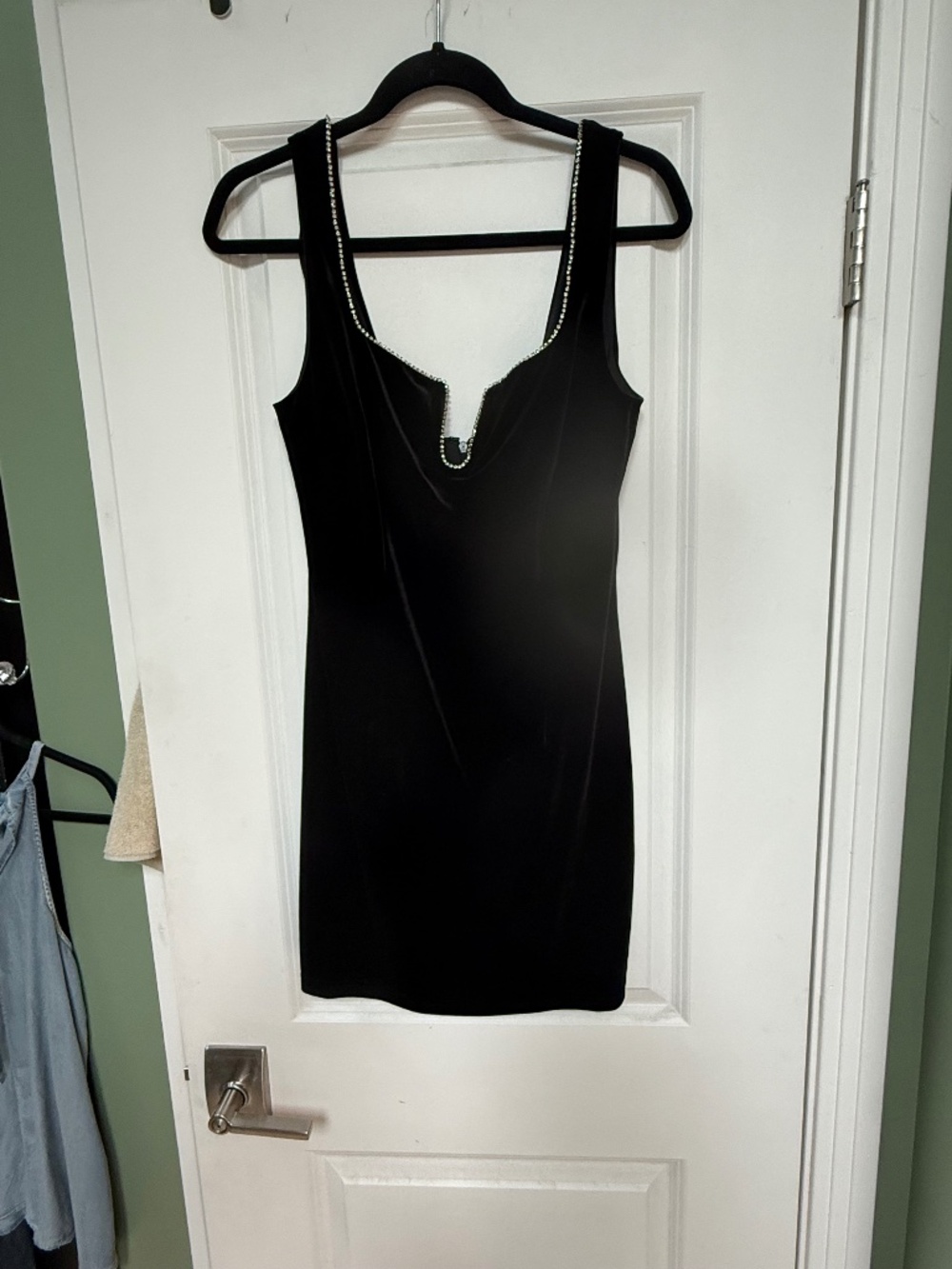 Black velvet dress with rhinestone trim